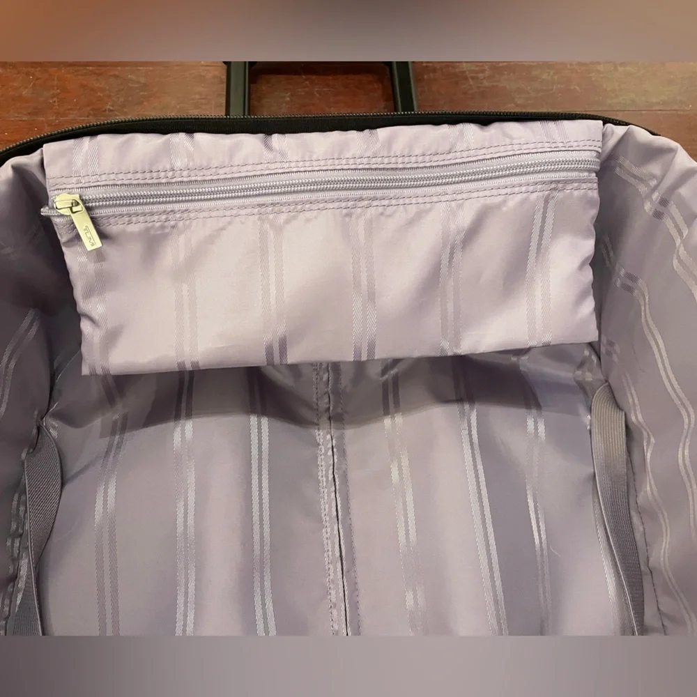 Tumi Black Rolling Suitcase